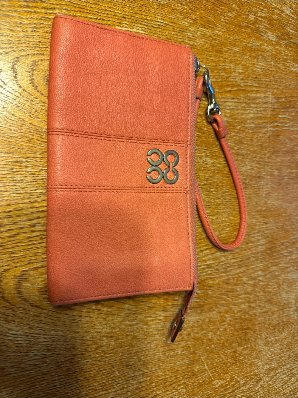 Coach Coral Leather Wristlet with Gold-Tone Logo